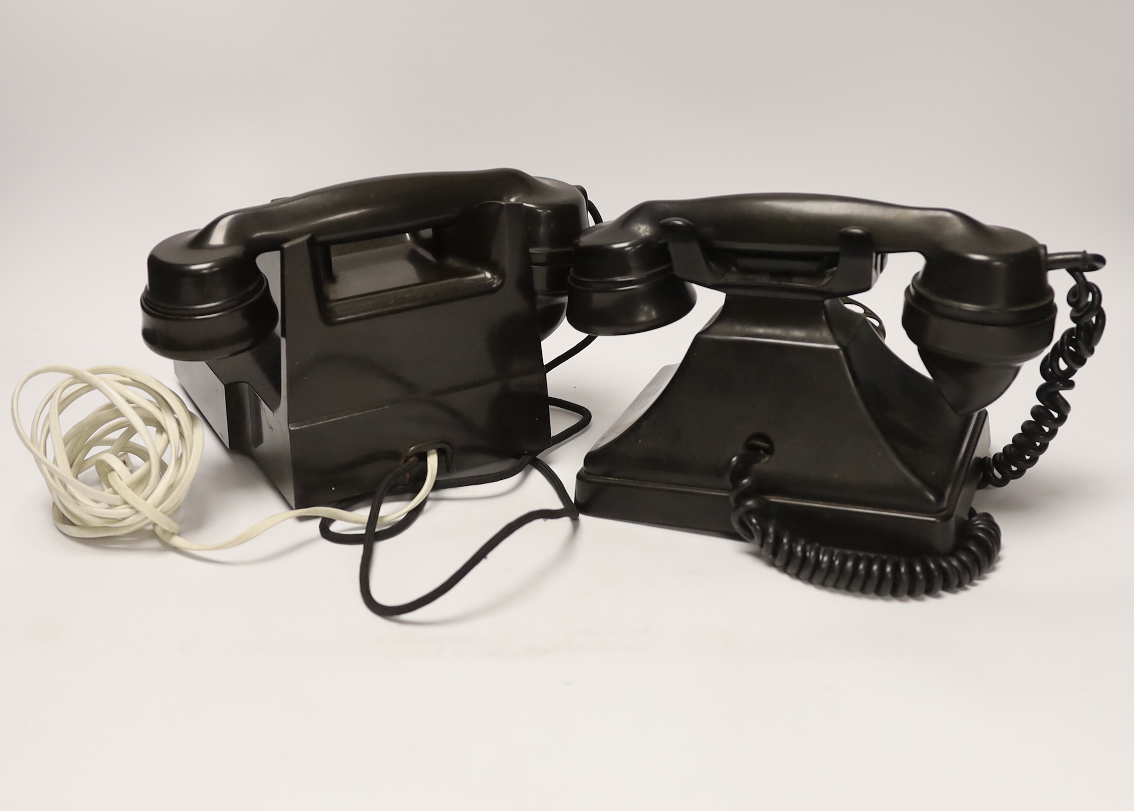 Two Bakelite vintage telephones 332L and 232L